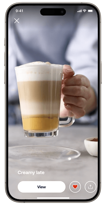 Išmanusis telefonas, kuriame rodomas „HomeID“ ekranas su kavos receptais